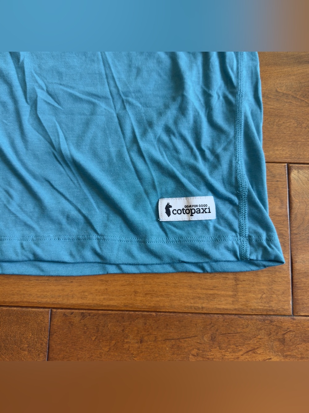 Cotopaxi teal short sleeve Paseo Travel tee with navy pocket size L - Picture 5 of 9